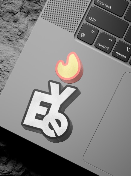 EYE flame mark as a sticker on a laptop