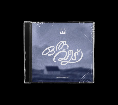 Crown Collective CD with Malayalam lettering on a blue cover