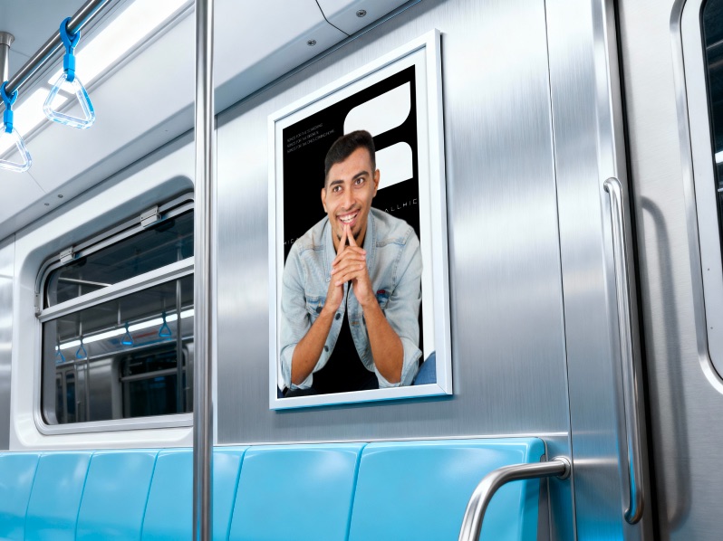 Framed Hicall poster inside a subway car
